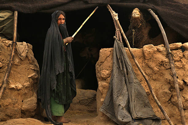 Kuchi woman at tent